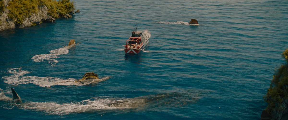 Le commensalisme illustré dans Jurassic World Rebirth, où Mosasaurus et Spinosaurus collaborent pour se nourrir, à la manière des baleines et des dauphins.